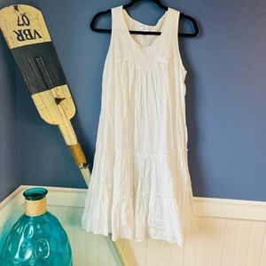 White, 10% cotton, lined dress.